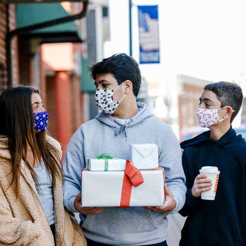 Candy Canes kid's face mask with red candy canes friends wearing masks with gifts