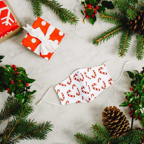 Candy Canes kid's face mask with red candy canes under Christmas tree