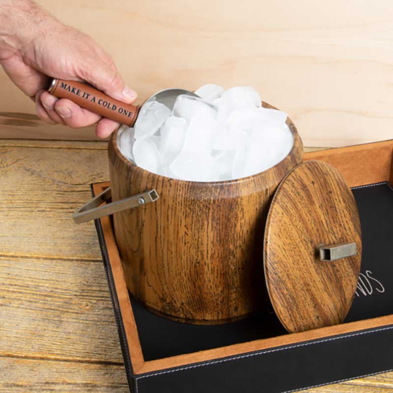 Cold One Ice Scoop in stainless steel with vegan leather handle lifestyle image