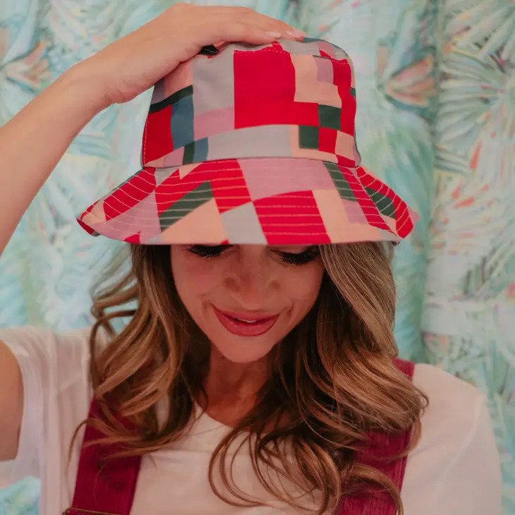 Color Block Bucket Hat for Women has geometric pattern with bold colors in reds, pinks, dark greens, and more