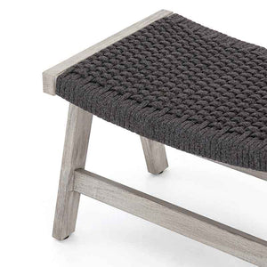 Delano Ottoman dark grey rope and weathered teak from Four Hands front edge detail