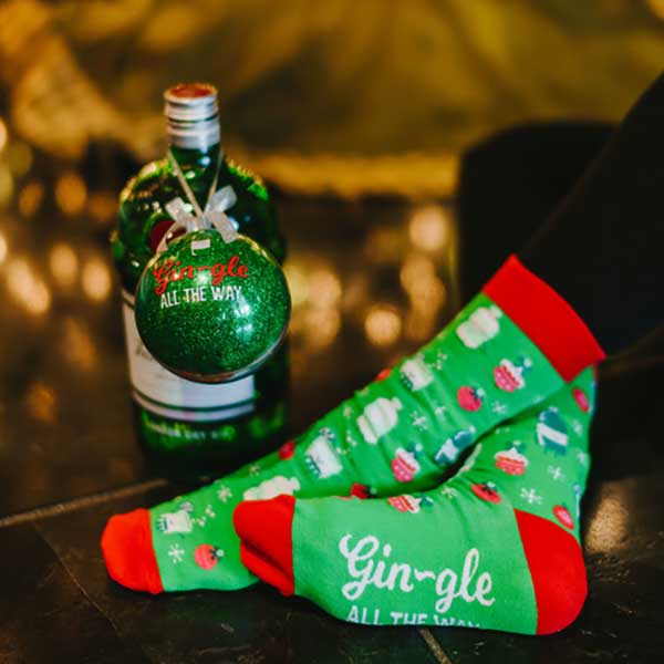 Gin-Gle Holiday Socks and ornament gift set green socks and ornament girl wearing socks