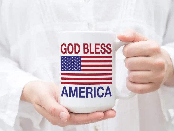 God Bless America Mug in hands of model