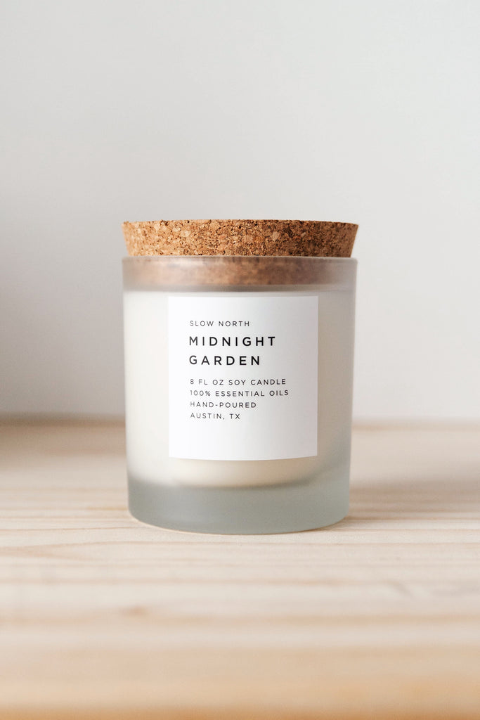 Slow North 100% Midnight Garden essential oil wax candle in frosted glass