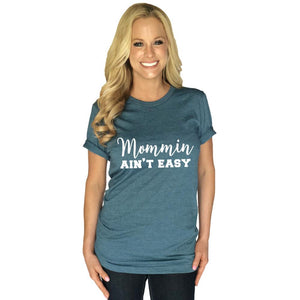 Mommin Ain't Easy women's t-shirt from Katydide with model wearing deep teal color