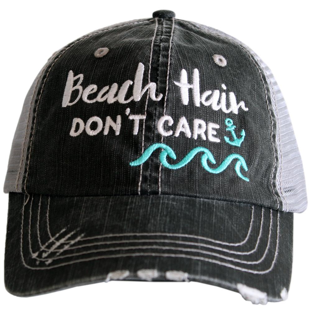 Beach Hair Don&#39;t Care Trucker Hat with mint colored waves on dark grey panel