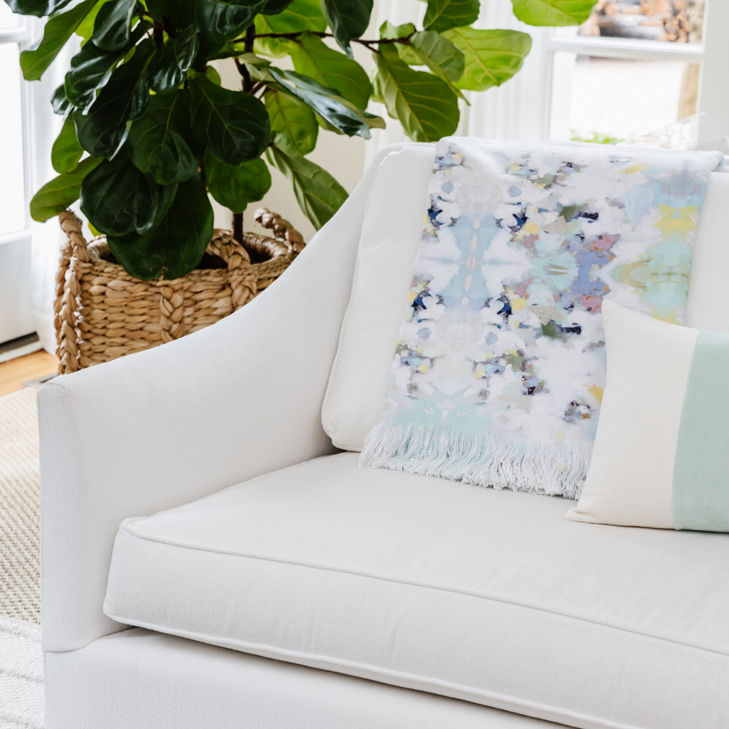 Lady Bird Throw Blanket sofa lifestyle image