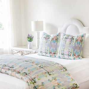 Lemonade Stand duvet cover in a variety of soft blues, greens, and yellows from Laura Park Designs