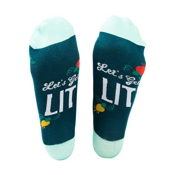 Let's Get Lit Holiday Socks and Ornament slogan on soles view