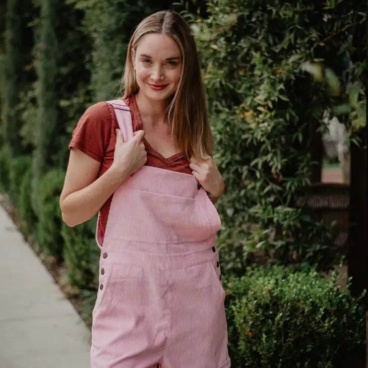 Light Pink Corduroy Overalls with a red tee shirt