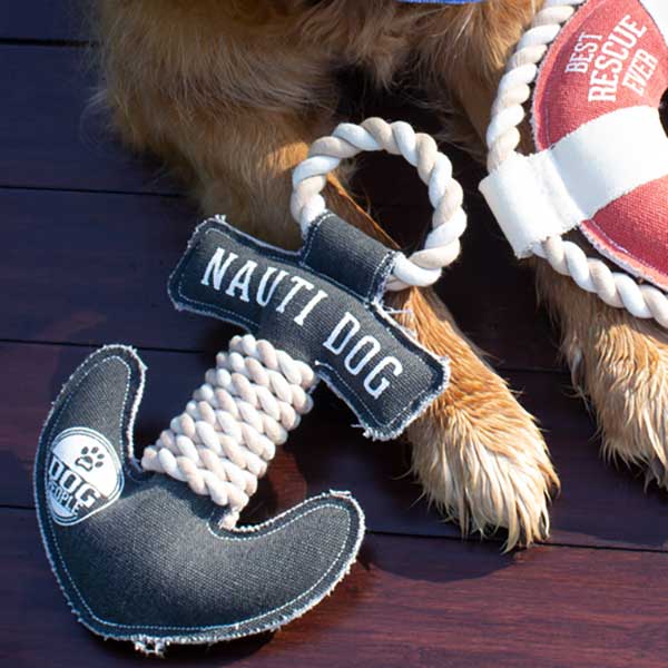 Nauti Dog canvas chew toy with squeaker made of polyester and cotton lifestyle with dog