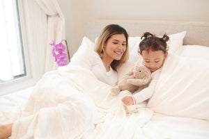 Bamboo Blanket Oversized Queen - Pristine White with mother and daughter on bed