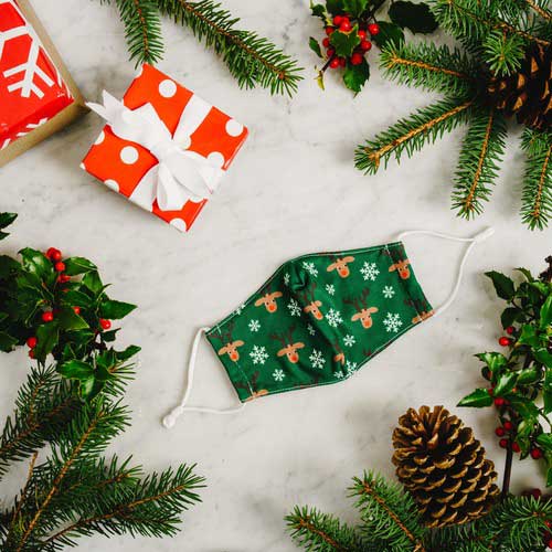 Reindeers & Snowflakes kid's face mask red-nose reindeers and snowflakes mask under tree