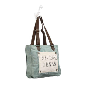 Turquoise Texas Small Bag Angled Image Myra Bag Harley Butler Trading Company
