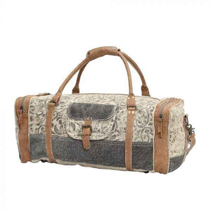 Floral print & hairon traveler bag with zippered compartments from Myra Bag front view