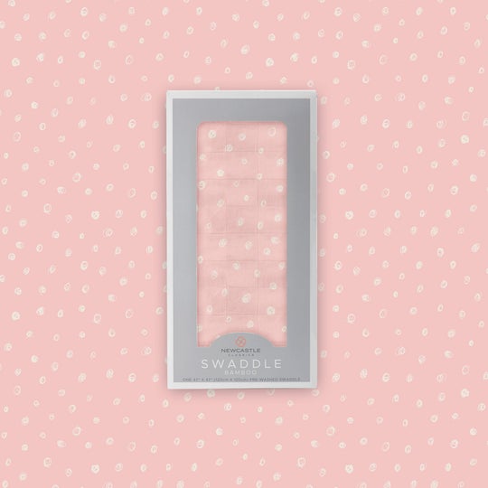 Pink Pearl Polka Dot Bamboo Swaddle with package on top