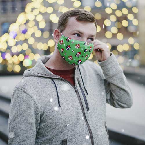 Santa Dog adult holiday mask with dogs in red caps man in mask