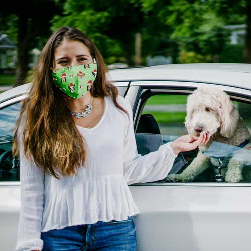 Santa Dog adult holiday mask with dogs in red caps woman and dog