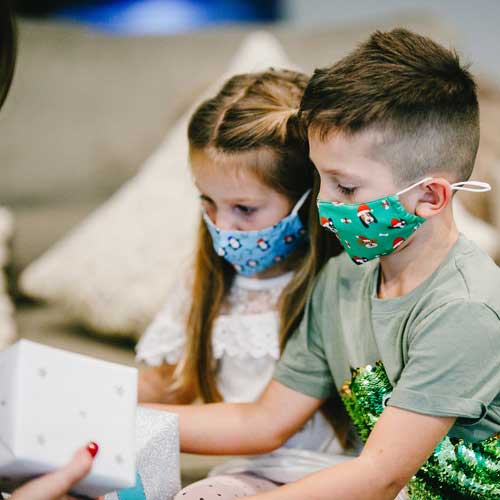 Santa Dog Kid's Mask with dogs in red caps and bones children wearing masks