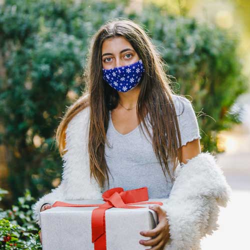 Snowflakes kid's face mask with snwoflakes on blue background teenager with gift