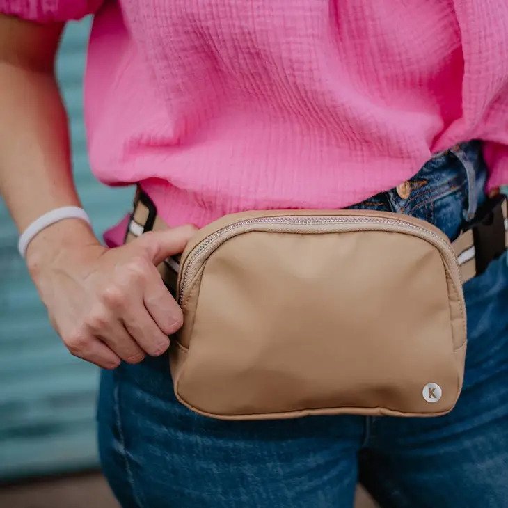 Tan Solid Fanny Pack with Striped Strap is perfect for casual or dressy looks