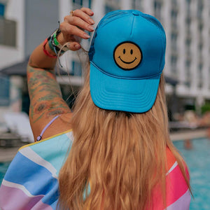 Happy Face Foam Trucker Hat with bright and colorful emoji patch