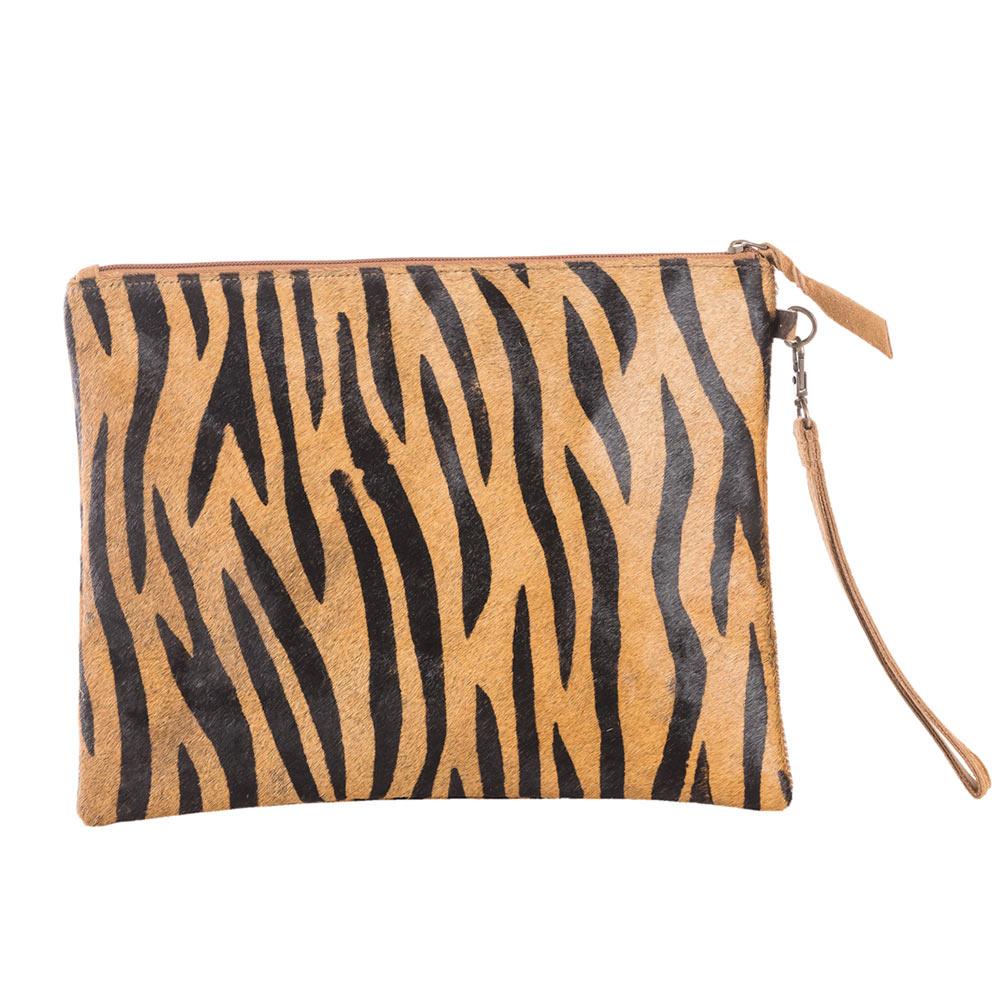 Brown & Black Zebra Hair On Leather Clutch next to seated woman 