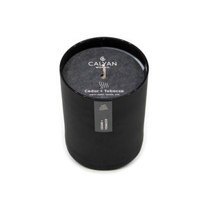 Black matte glass tumbler candle Cedar + Tobacco fragrance from Calyan Wax Company