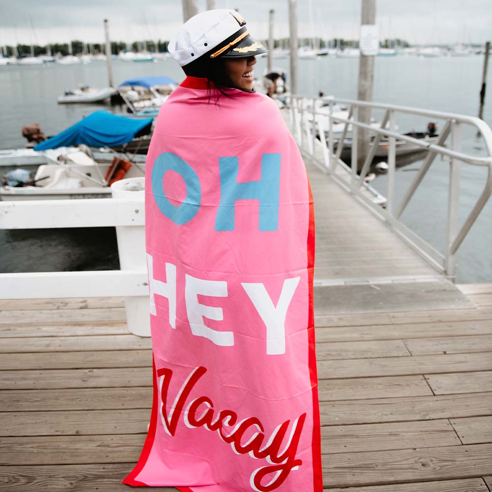 Oh Hey Vacay Quick Dry Beach Towel wrapped around woman on boat dock