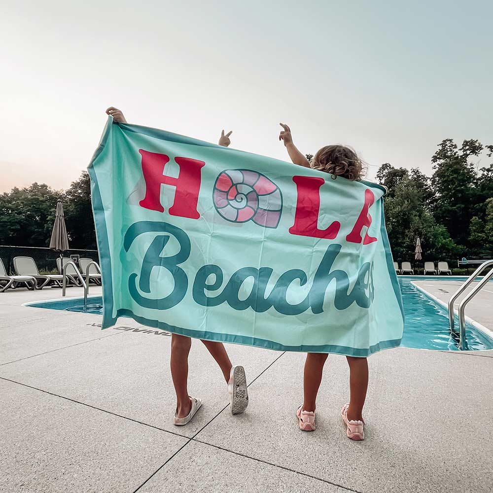 Hola Beaches Quick Dry Beach Towel in blue is quick drying and sand free
