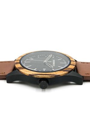 Zebrawood watch with brown leather strap and black dial from Everwood laying flat