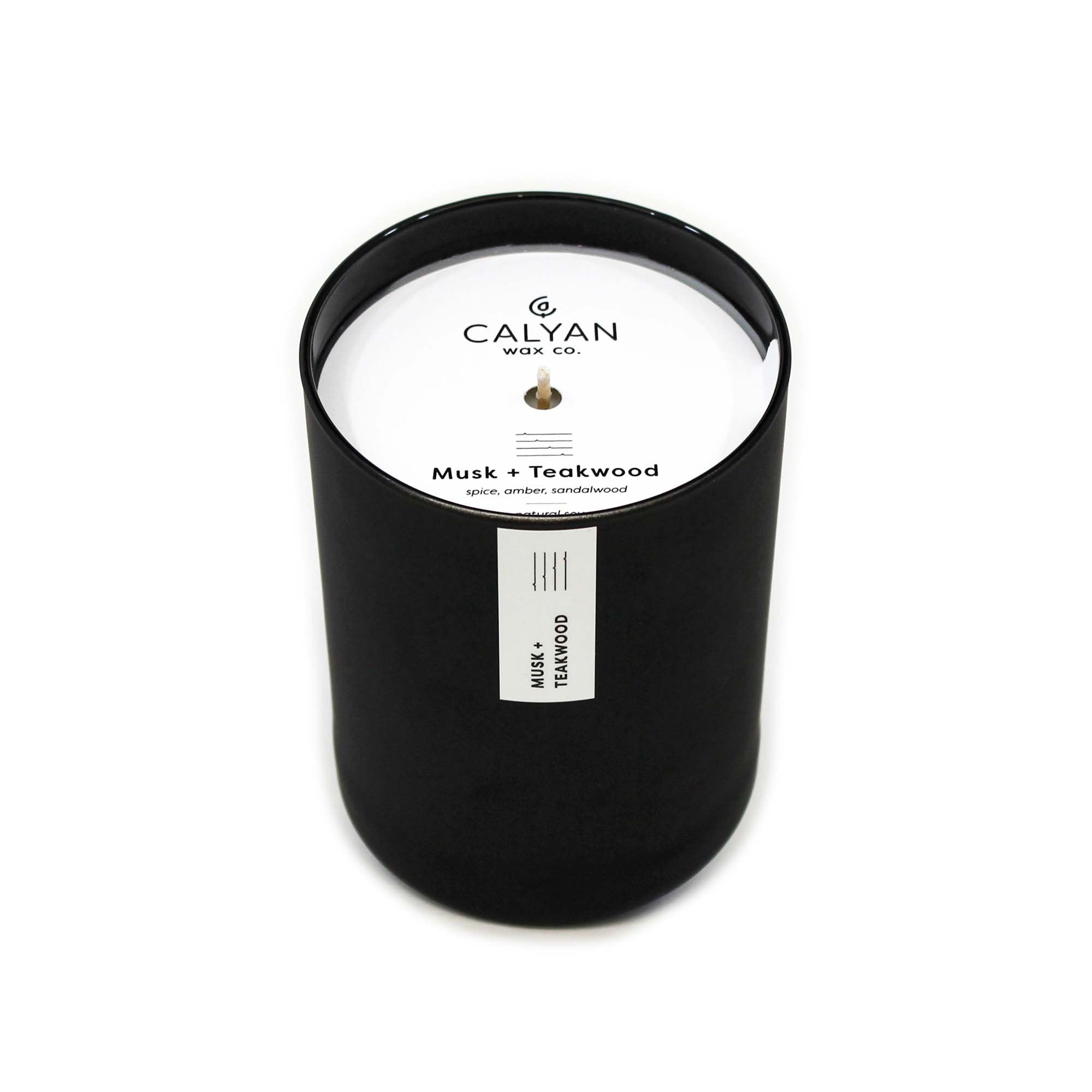 Black matte glass tumbler candle Musk + Teakwood fragrance from Calyan Wax Company
