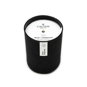 Black matte glass tumbler candle Musk + Teakwood fragrance from Calyan Wax Company