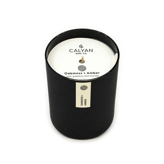 Black matte glass tumbler candle Oakmoss + Amber fragrance from Calyan Wax Company
