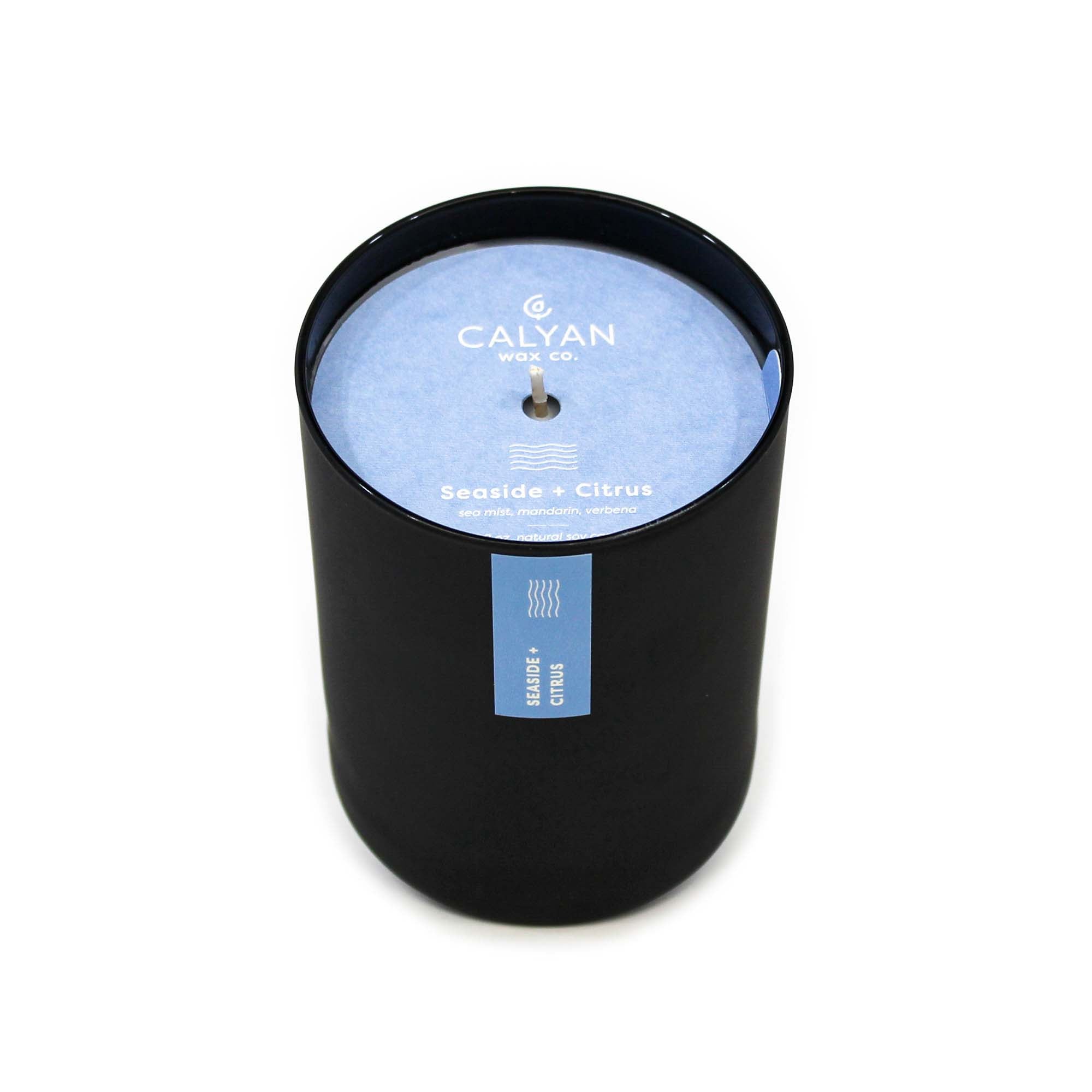Black matte glass tumbler candle Seaside + Citrus fragrance from Calyan Wax Company