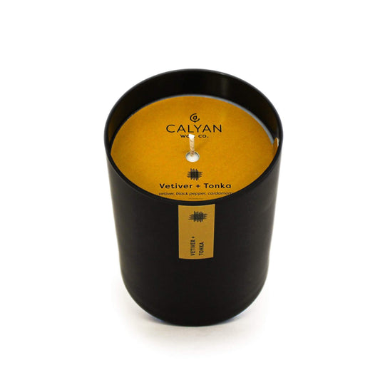 Black matte glass tumbler candle Vetiver + Tonka fragrance from Calyan Wax Company