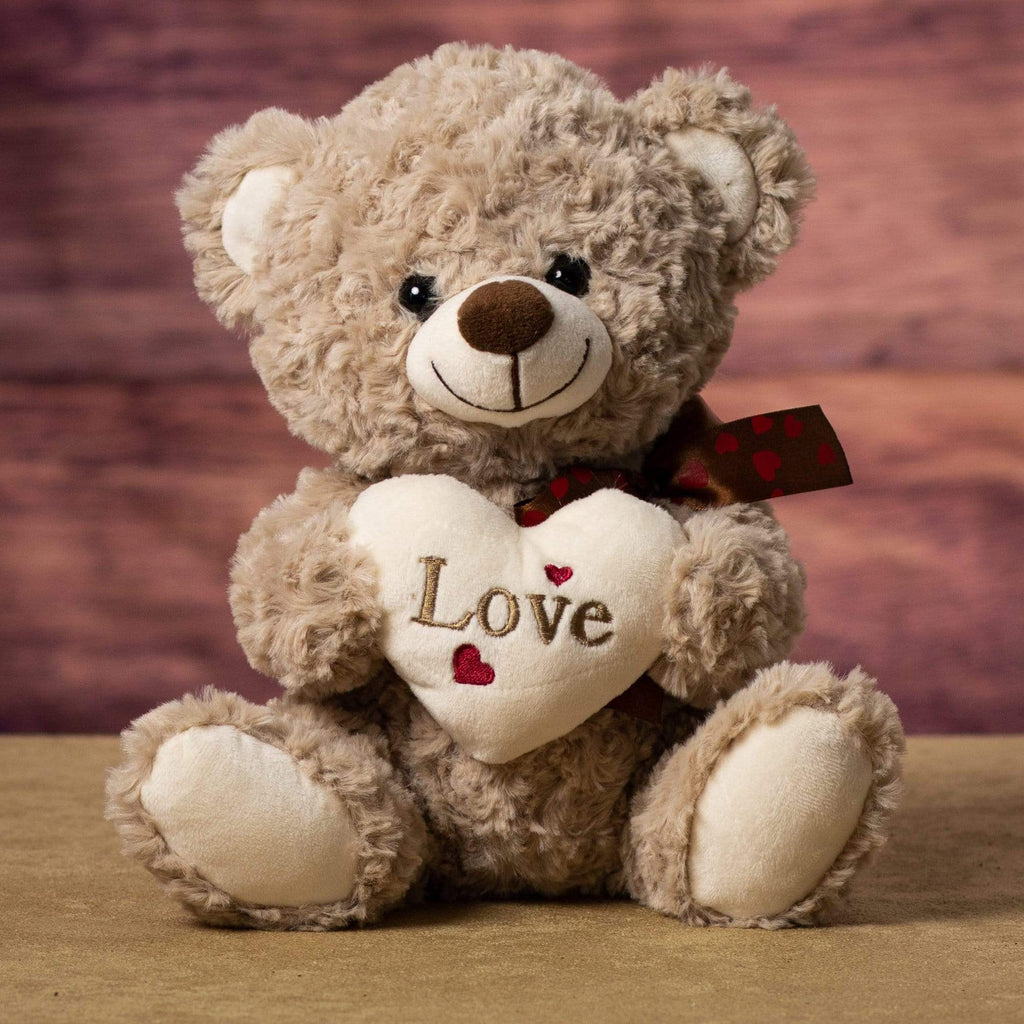 Plush Valentine Bear is 9" tall sitting